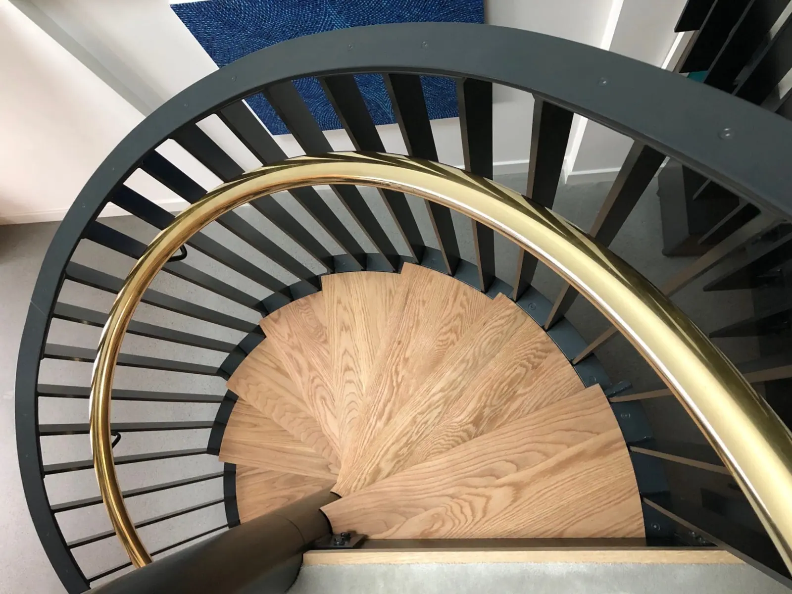 Spiral steel staircase fabricated by Millwright Engineering